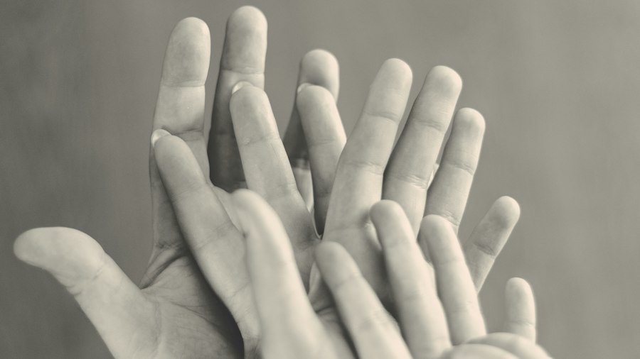 Hands of different sizes held together