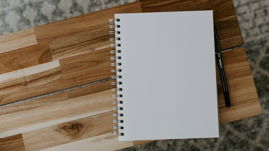 Open notebook on a wooden table