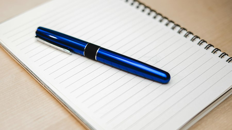 Blue pen on a lined notebook