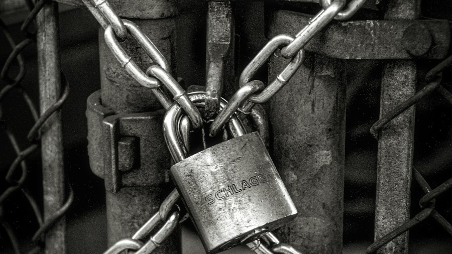 Padlock securing a closed gate