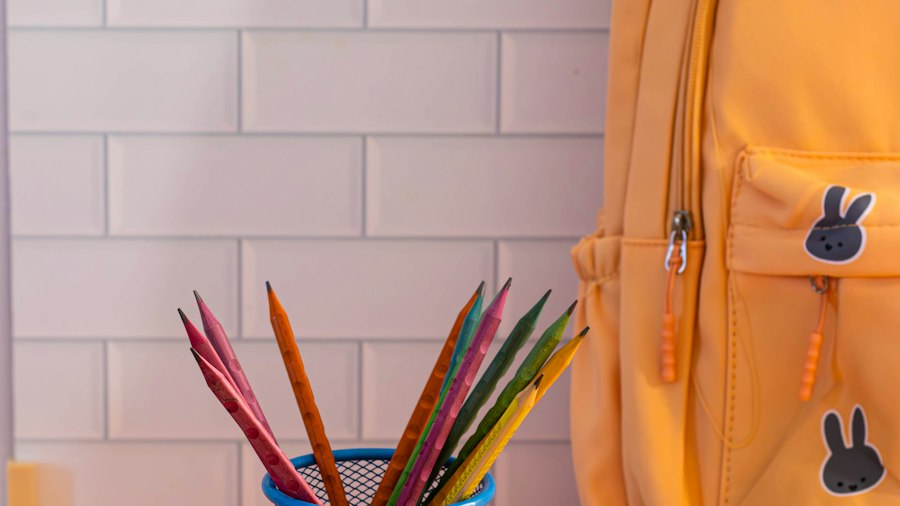 School backpack and colored pencils